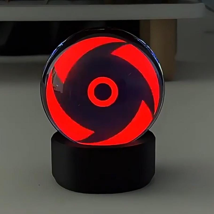 Visual Prowess: Infinite Sharingan Music-Sync Sphere