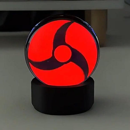 Visual Prowess: Infinite Sharingan Music-Sync Sphere