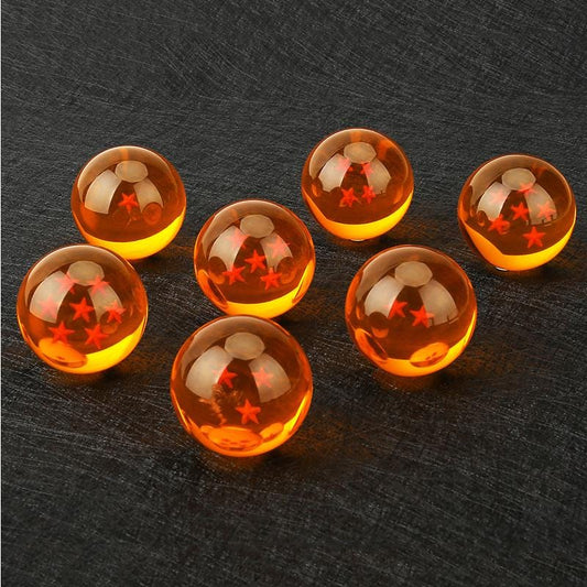 Full 7-piece set of amber resin Dragon Balls with 3D internal stars on a display stand.
