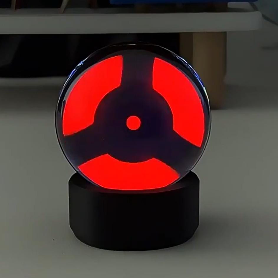 Visual Prowess: Infinite Sharingan Music-Sync Sphere