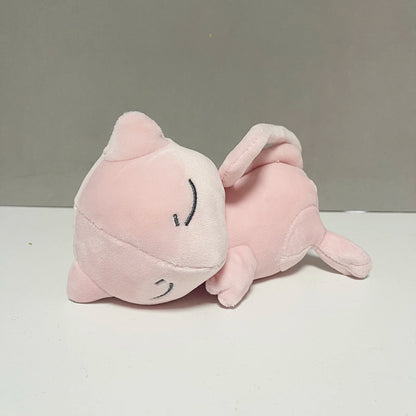 Premium Mew 19cm artisan plush with long tail and pink high-density fiber.