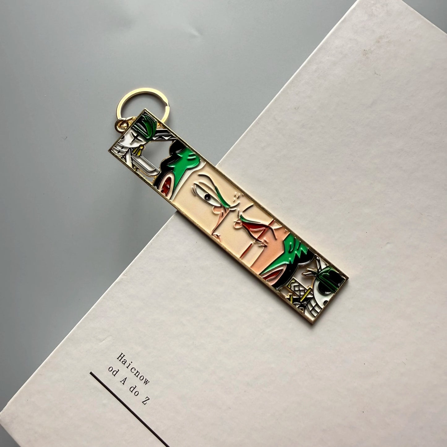One Piece Hollow-Out Metal Bookmark & Keychain – Gold Anime Bag Tag