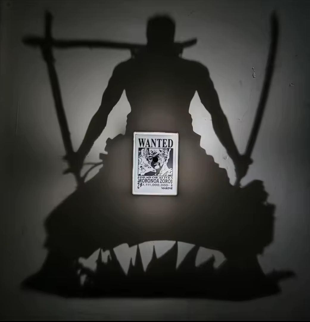 Roronoa Zoro King of Hell 3D shadow box lamp glowing green in a dark room.